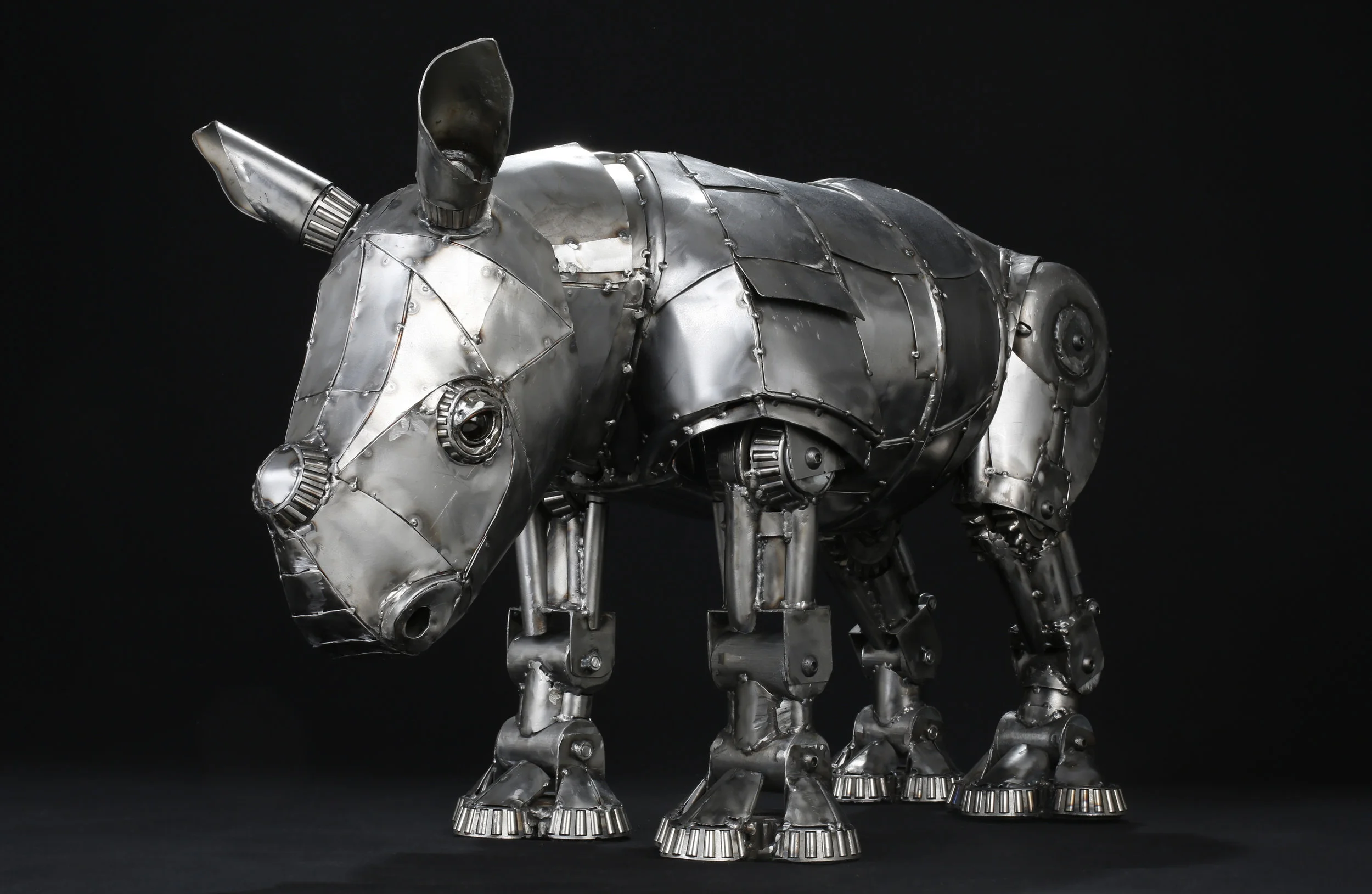 Baby Rhino Metal Sculpture - Sad.JPG