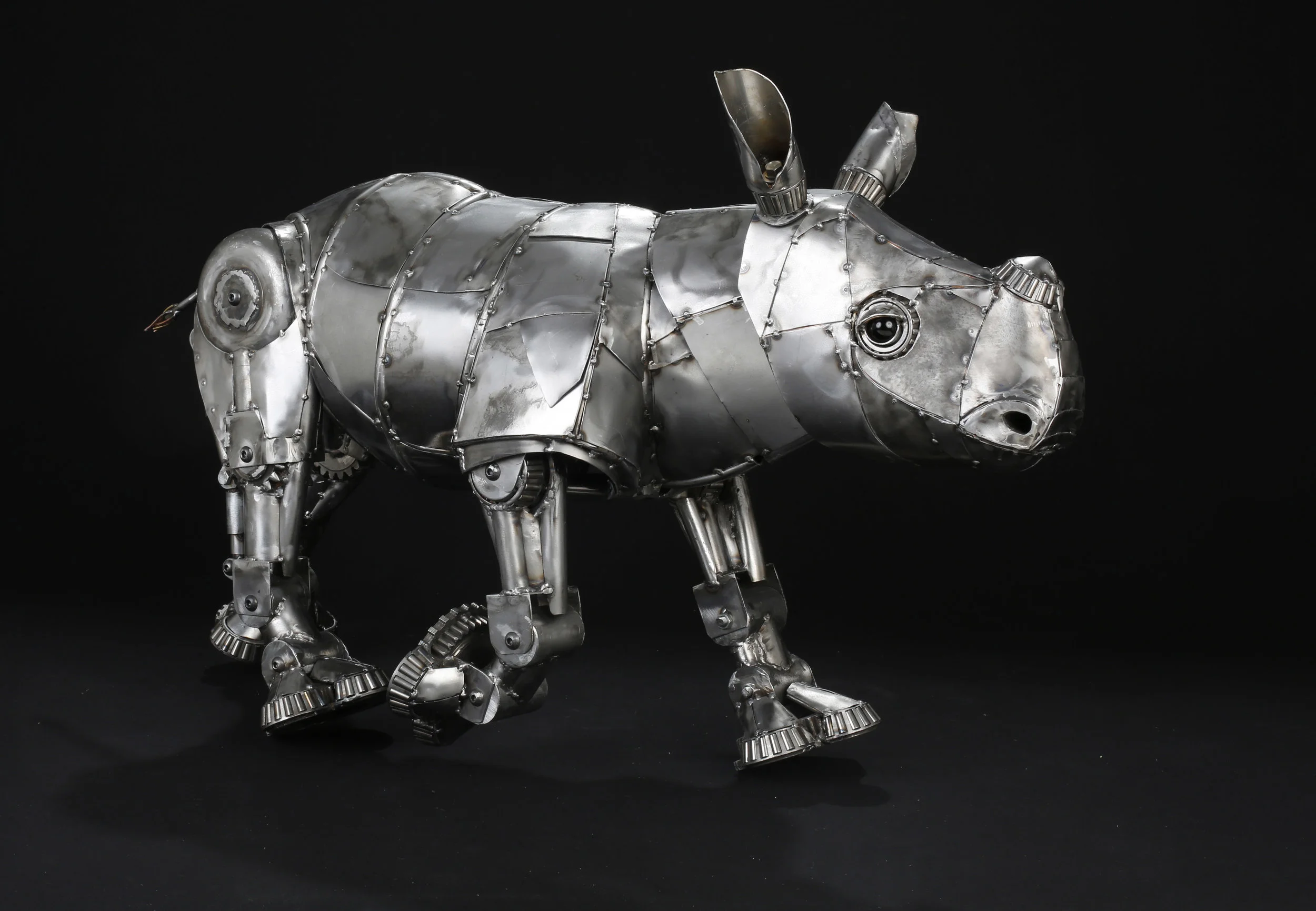Baby Rhino Metal Sculpture - Trotting.jpg