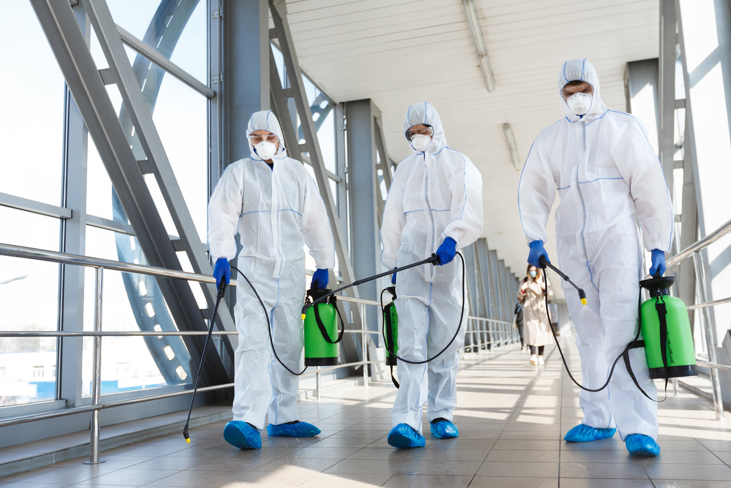 medical-staff-wearing-protective-clothing-disinfec-ZNPEJNA.jpg