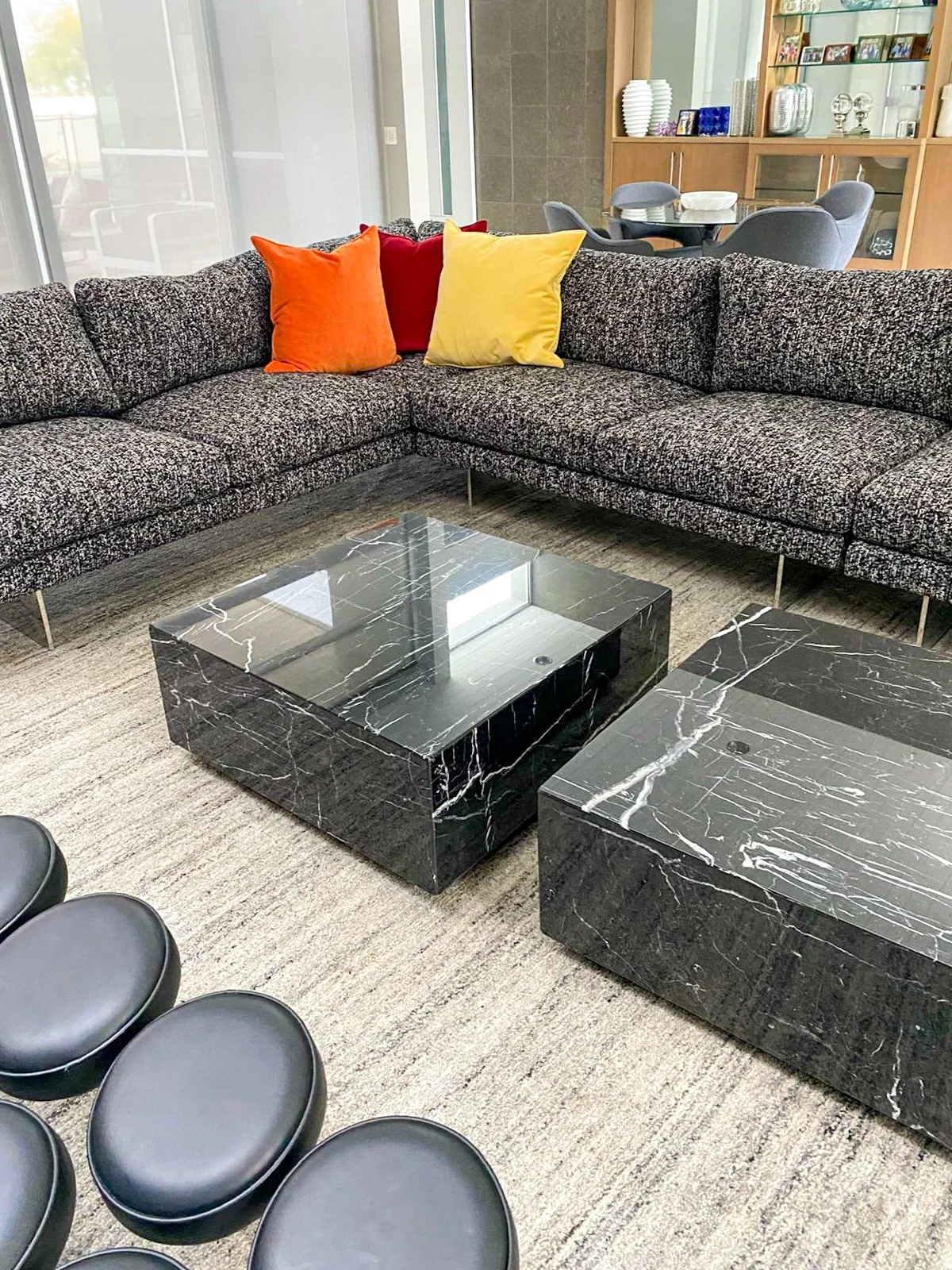 Greater Palm Springs luxury family room design featuring various custom pieces, including the sectional, coffee tables, neutral rug, and Bauhaus sofa.