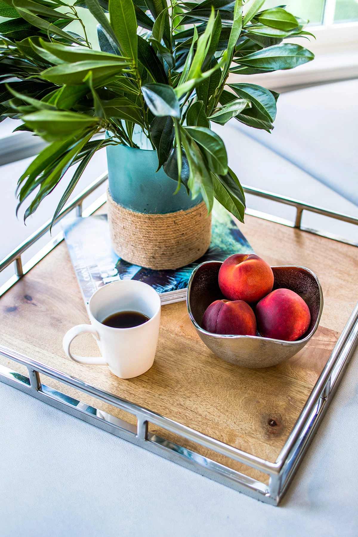 Wood tray with turquoise vase