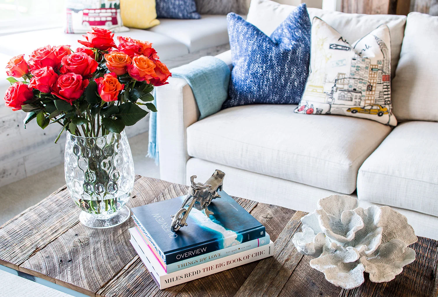 Reclaimed wood coffee table with books and accessories