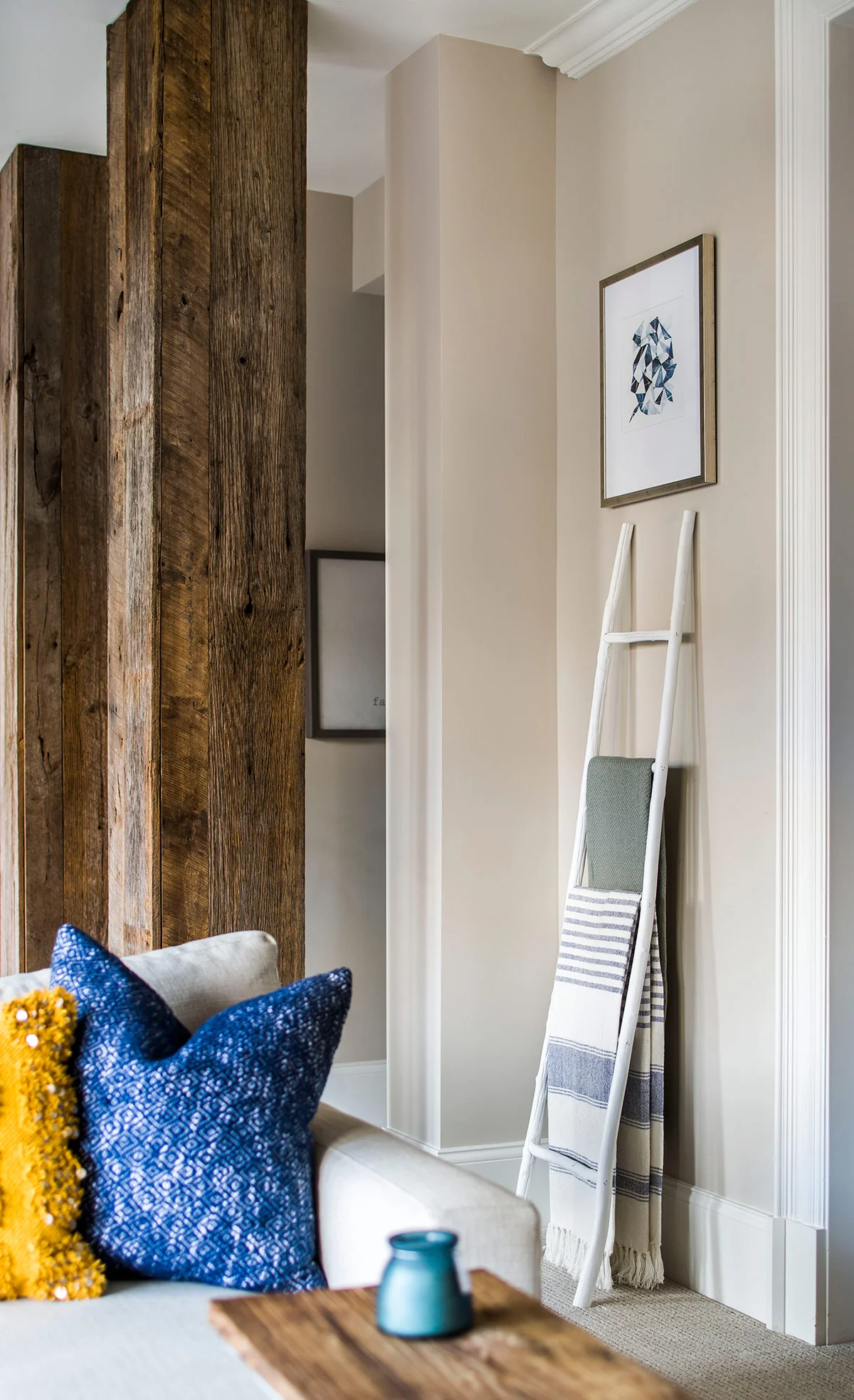 Leaning ladder stores blankets in basement