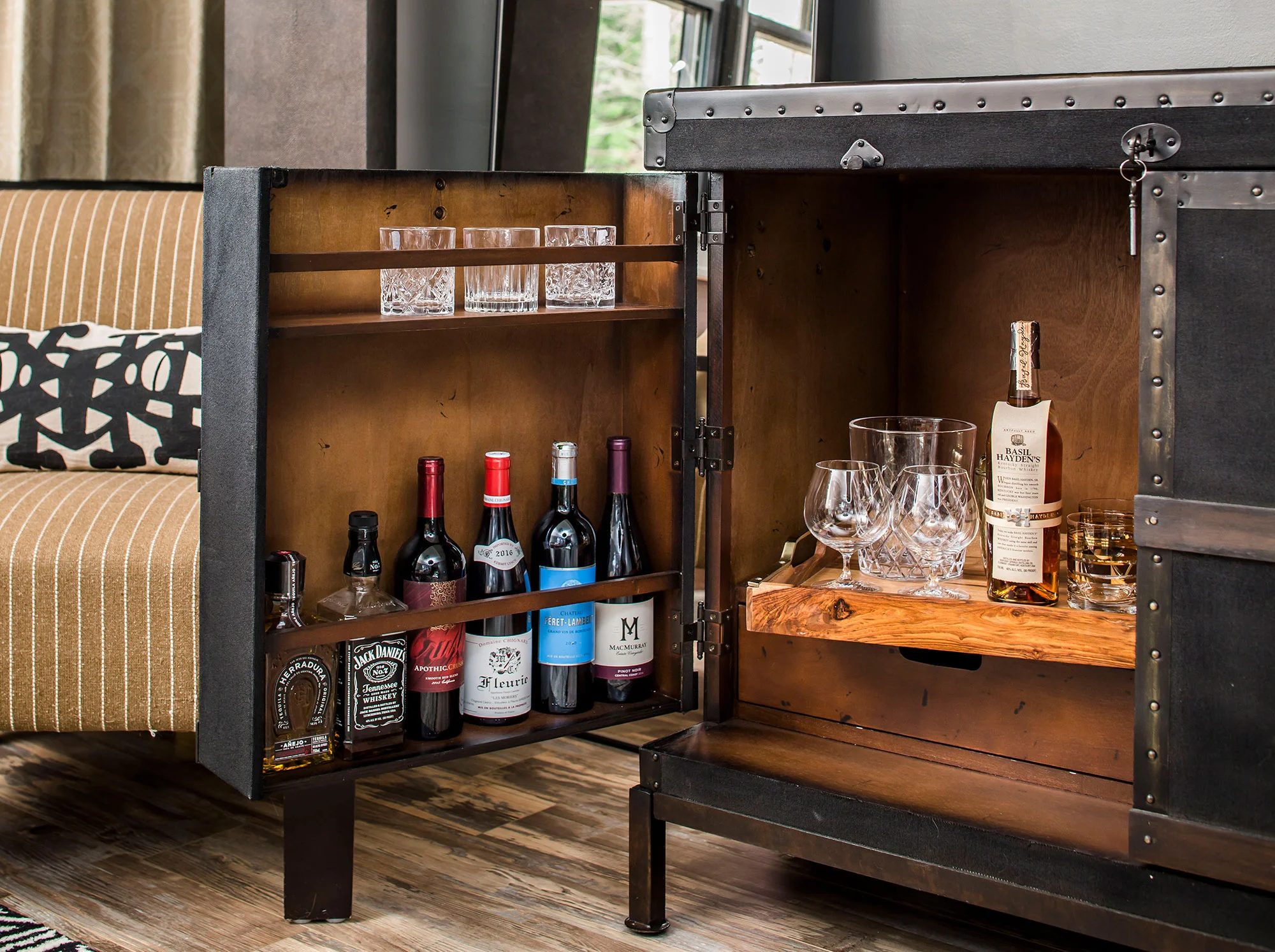 Industrial leather trunk with hidden storage in basement office
