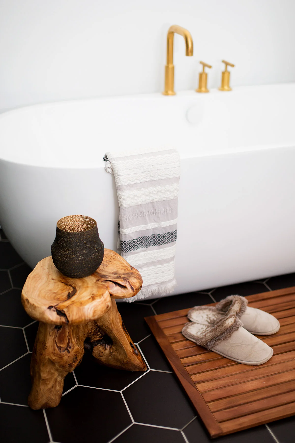 Freestanding tub in midcentury modern master bathroom