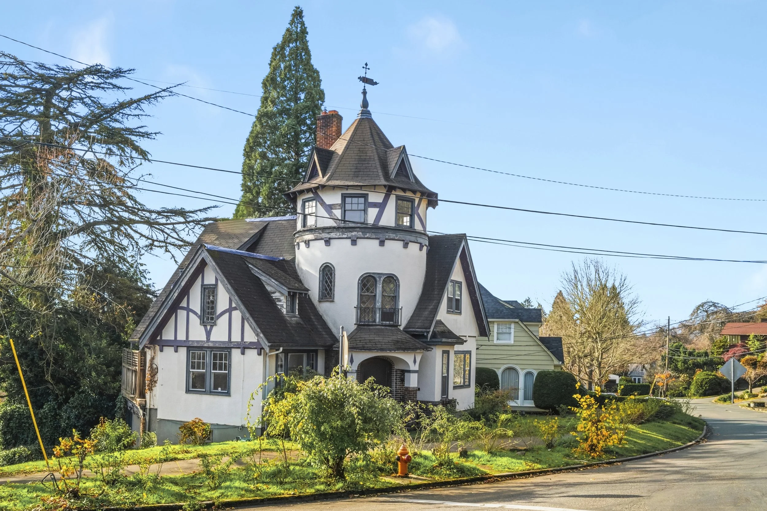 1928 storybook house with double-decker turret on NE Wistaria Drive in Portland’s Beaumont-Wilshire neighborhood