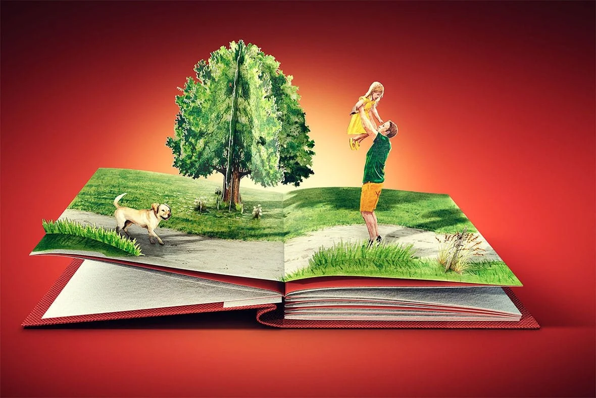 Open storybook with a 3D scene of a man lifting a girl in a yellow dress, trees, grass, a dog, and a rabbit against a red background.