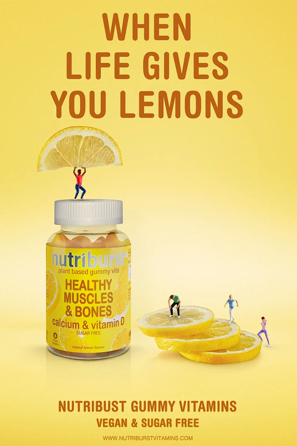 An advertisement for Nutriburst gummy vitamins featuring a bottle of gummies and lemon slices with miniature people interacting with the lemons, against a yellow background, with text that reads "When life gives you lemons" and product benefits inclu