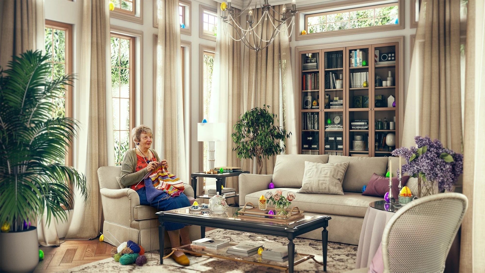 A cozy living room decorated with cream curtains, a large window, and indoor plants. An elderly woman is sitting on a beige armchair, knitting with colorful yarn. There is a wooden bookshelf with decor and books in the background, a gray sofa with cu