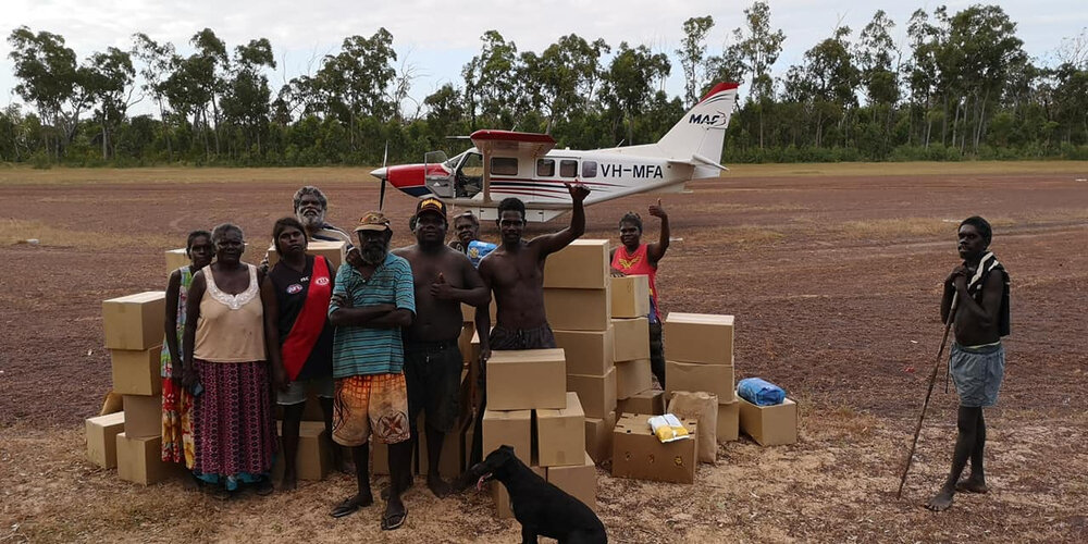 1000x1000-‘WOOLIES’ Food Boxes Flown Out to Aboriginal Homeland.jpg