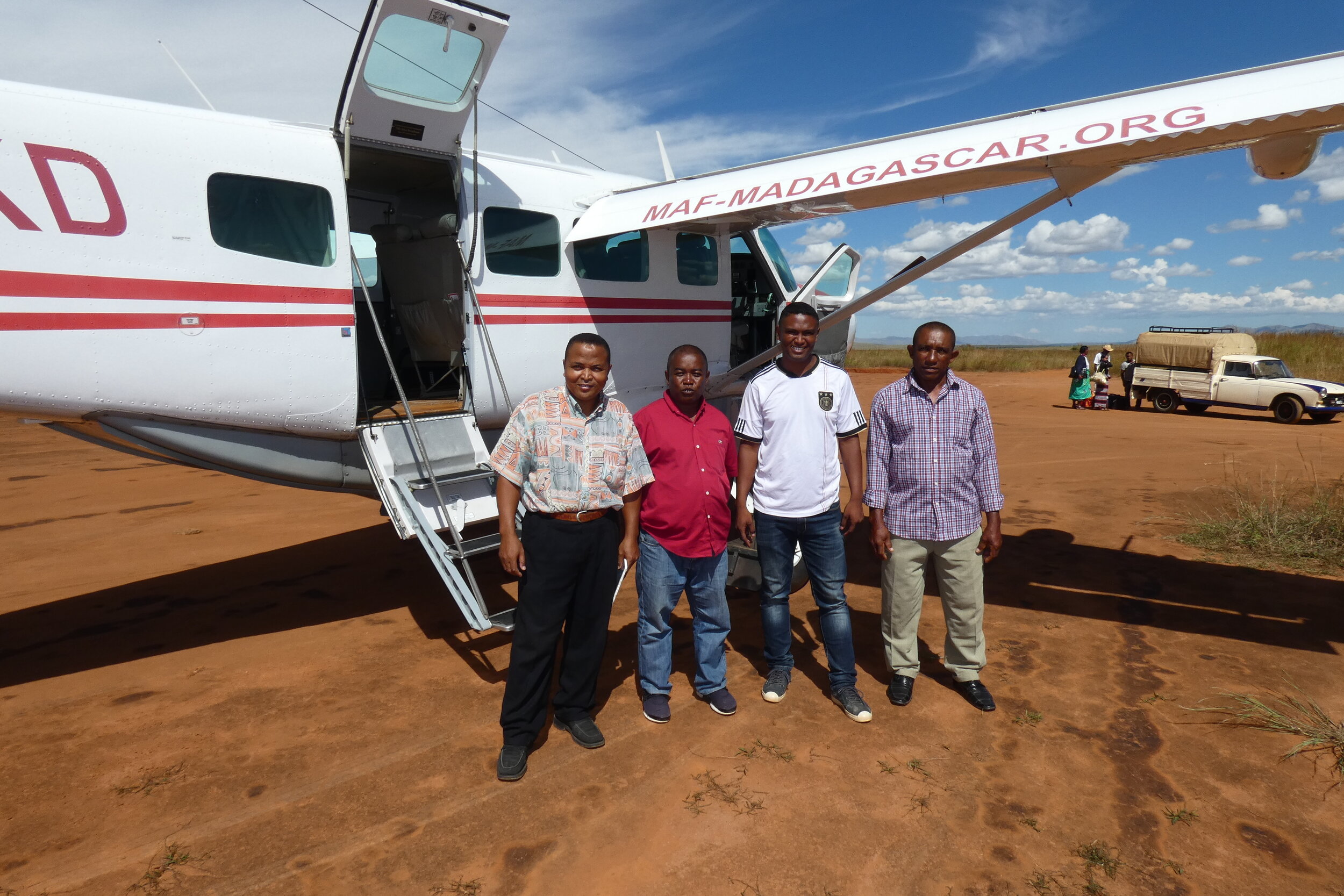 Bible translators at the airstrip.JPG