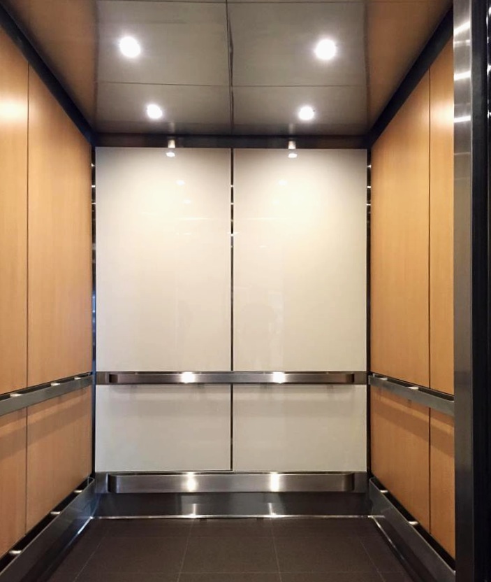 St.Thomas (Nash.)- Installed brushed stainless steel ceiling, glass wall panels on back, laminate wall panels on side walls, brushed stainless steel hand rails & bumper rails with carpet flooring