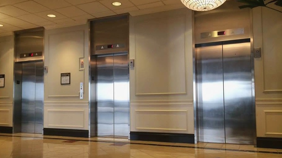 Wyndham Atlanta Galleria - Installed brushed stainless steel entrance frames.