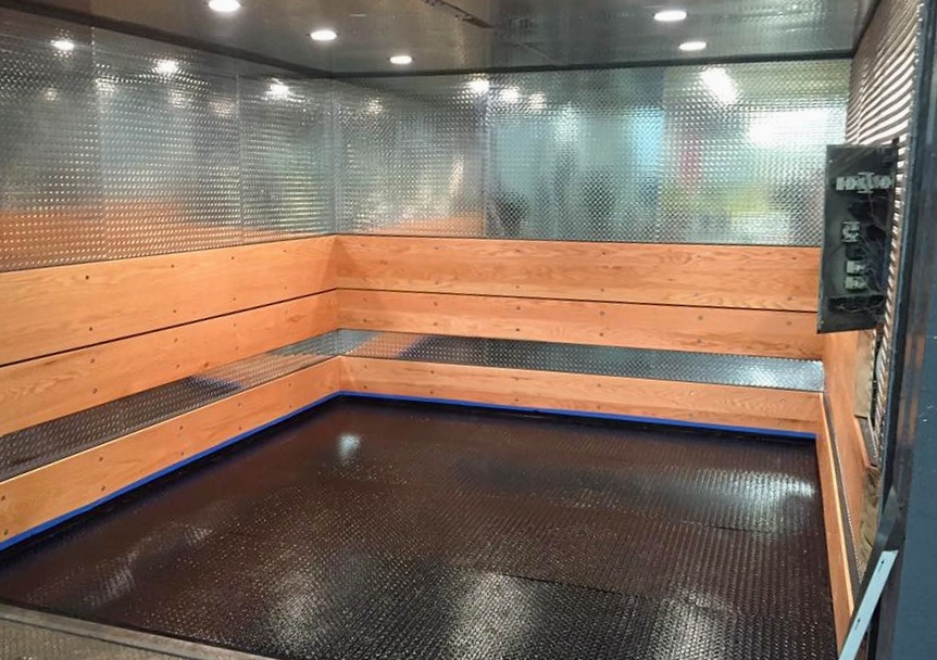 Thomaston, GA - Textile Plant - Installed aluminum tread plate wall panels and wooden bumper rails