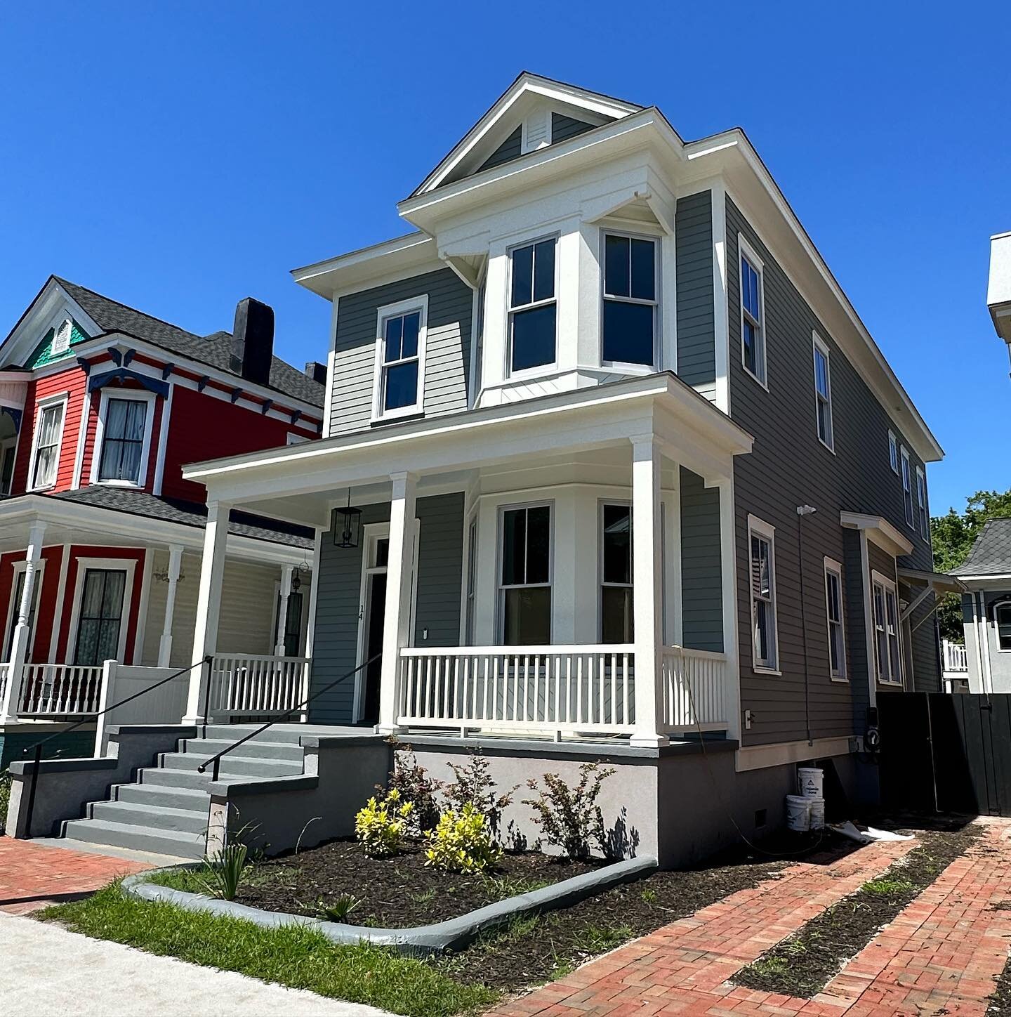 New single family house in the Thomas Square Streetcar historic district.  Using the traditional side hall form, our design incorporated modern details and spaces to create a cohesive streetscape.  Built by Wells Anderson Construction, well done!