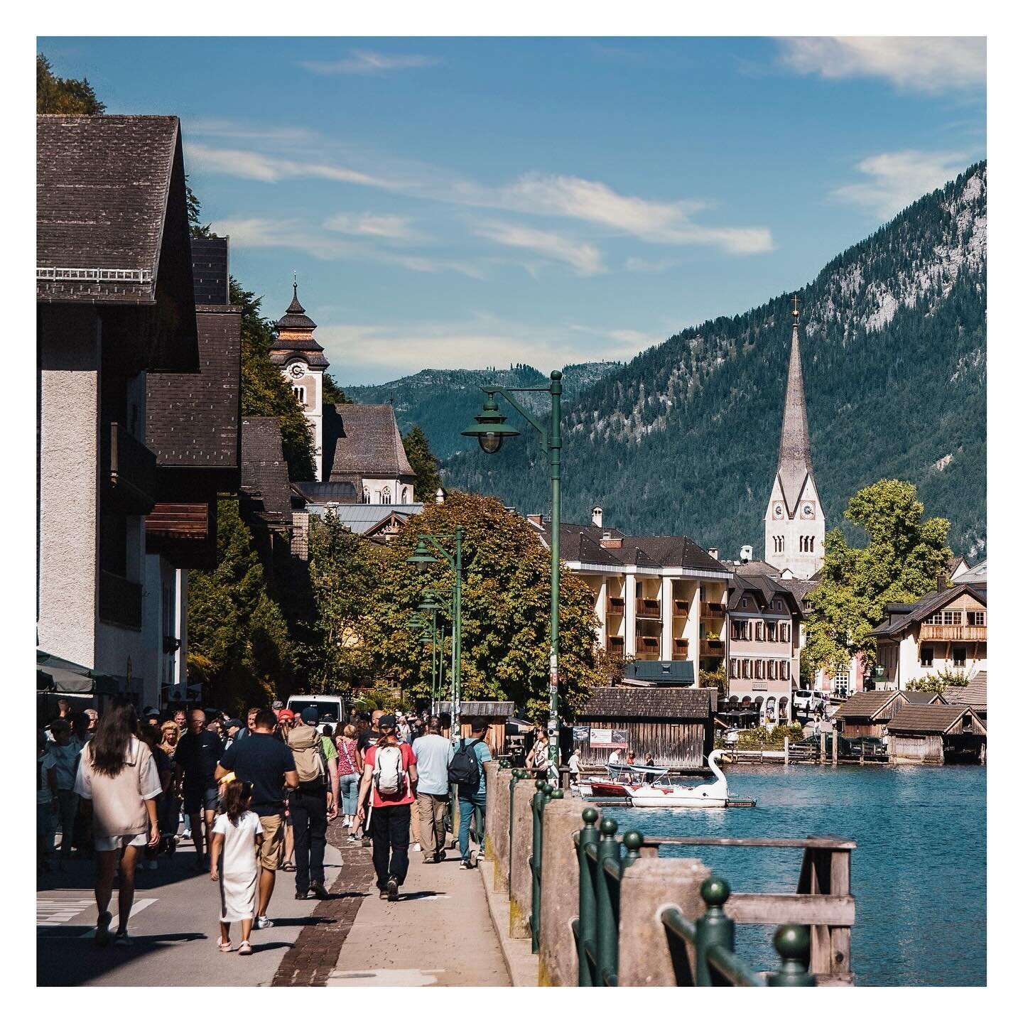 Crowded lake promenade in the UNESCO World Heritage Site Hallstatt at Lake Hallstatt during one of the last summer days. To the right you have a beautiful view of the lake while walking towards the main market square.

#landscape #hallstatt #photogra