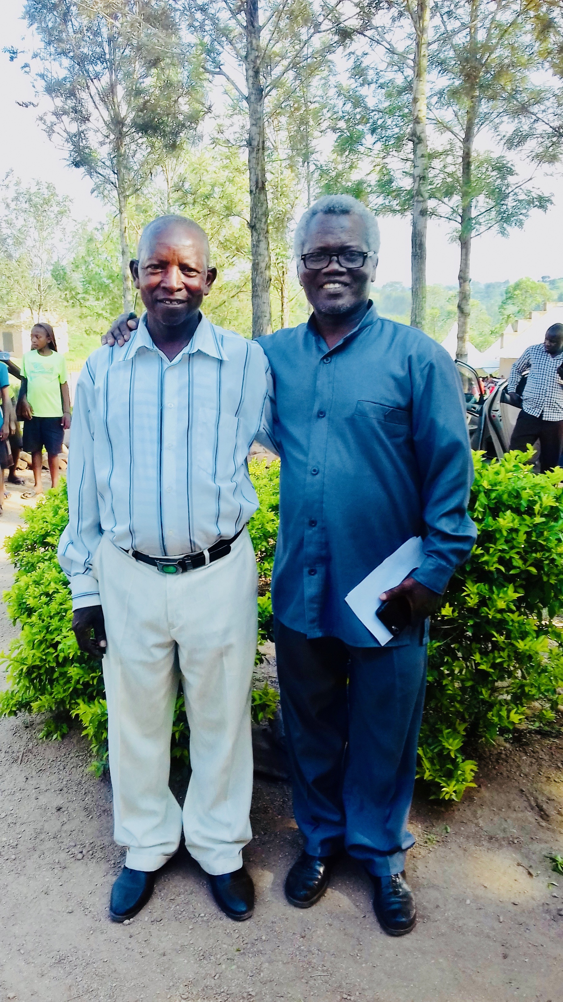 Immanuel and regional leader John Nyamwema, Kamwenge.jpg