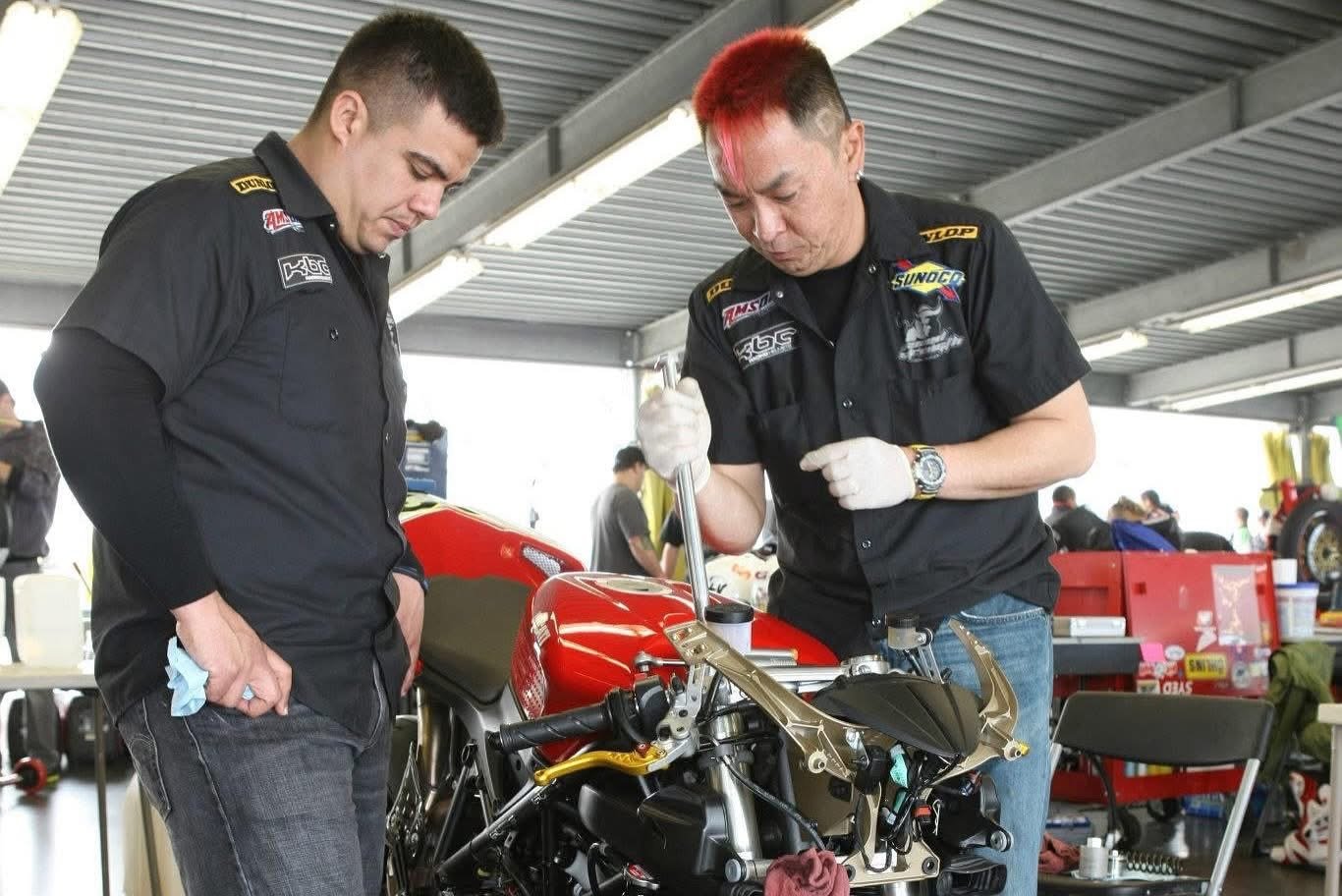 Jose Flores with Mr. Lee his crew chief at AMA Pro Racing in Daytona Florida 2011 part of the Ducati 848 Evo Program