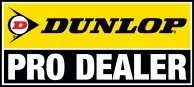 Dunlop Pro Dealer sign with black, yellow, and white colors.