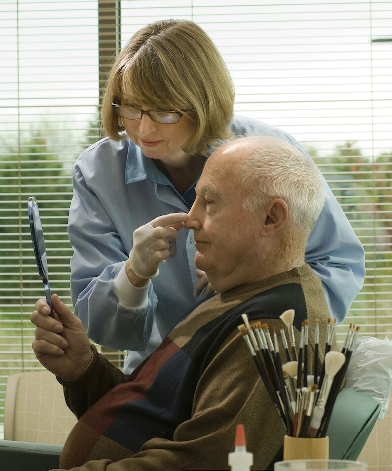 Prosthetic nose with adhesive attachment