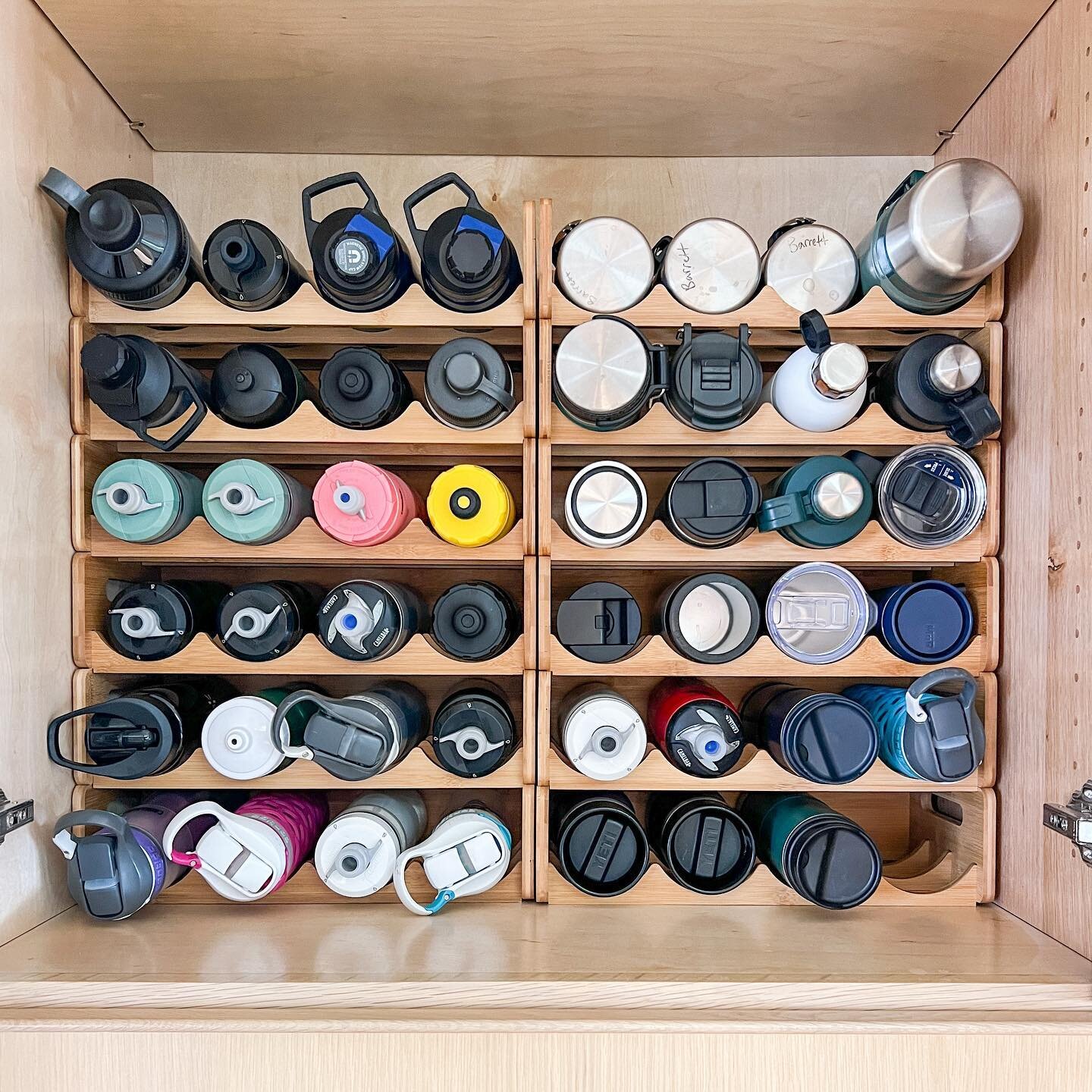 Water bottles are always one of the biggest pains to store. How often do you open a cabinet to water bottles falling over or go to grab your favorite and can&rsquo;t find the lid? This was one of my client&rsquo;s biggest struggles at their previous 