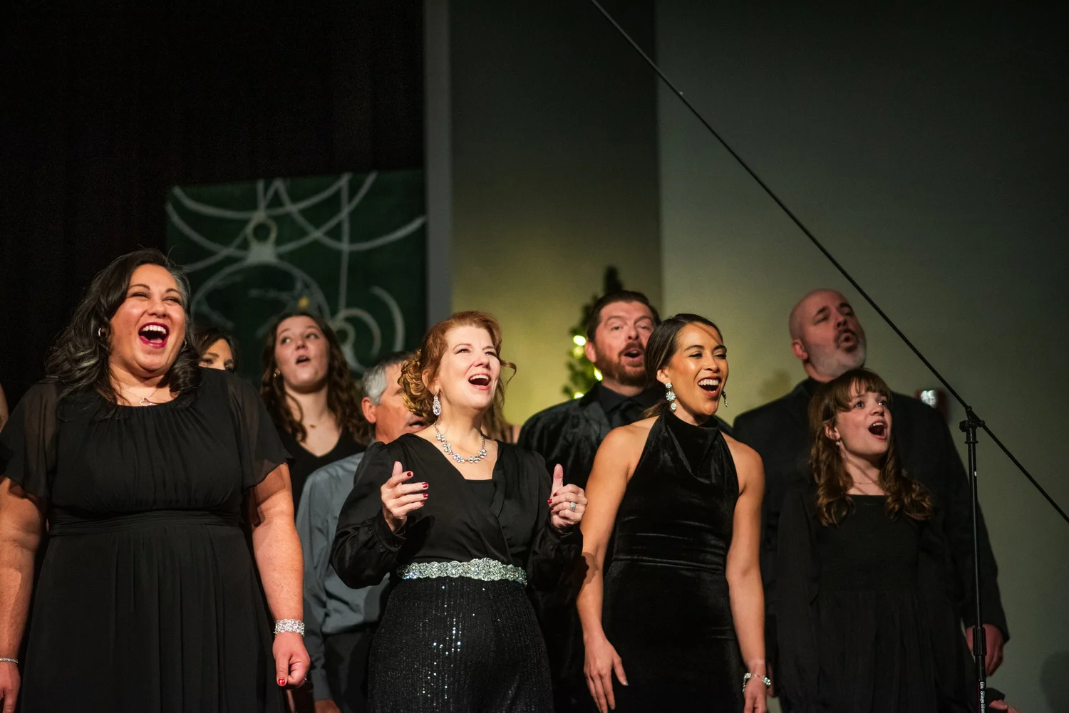 Performers on stage at House for the Holidays 2025