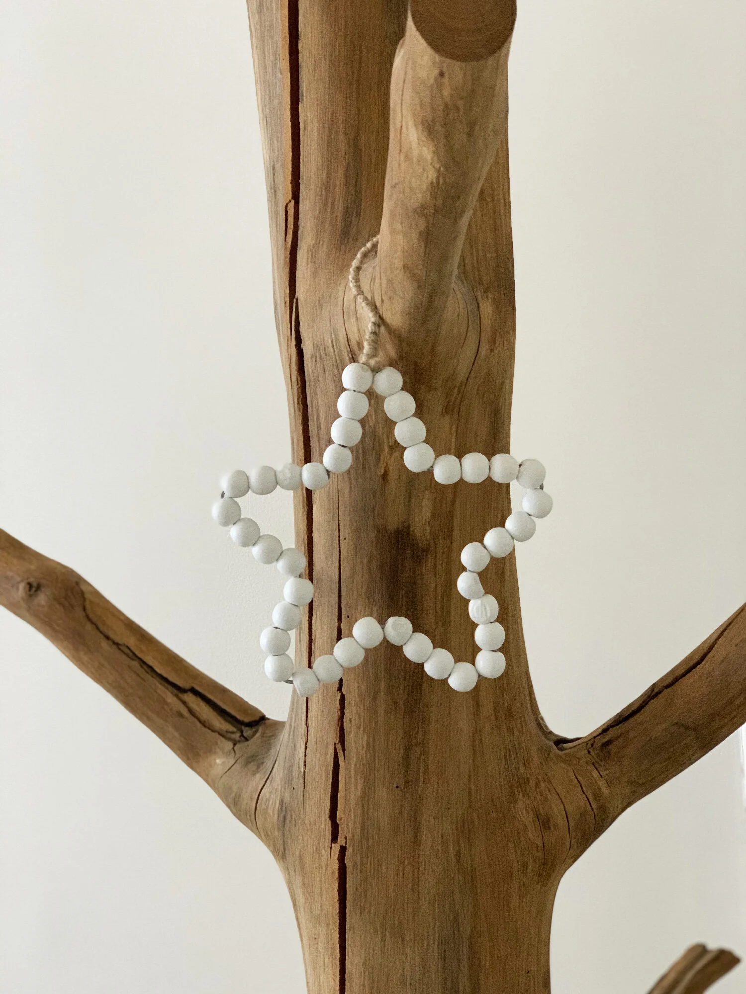Etoile suspendue avec perles