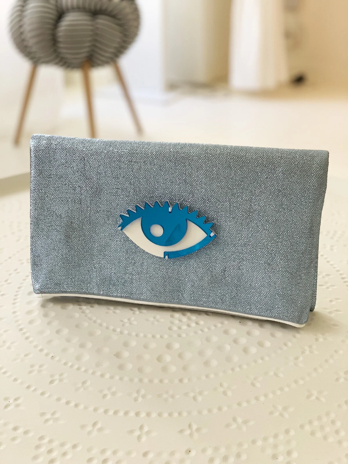 Pochette pliable à bouton pression oeil