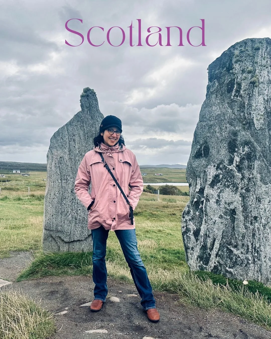 Gigi Pandian standing at the Callanish Standing Stones on the Isle of Lewis, Scotland