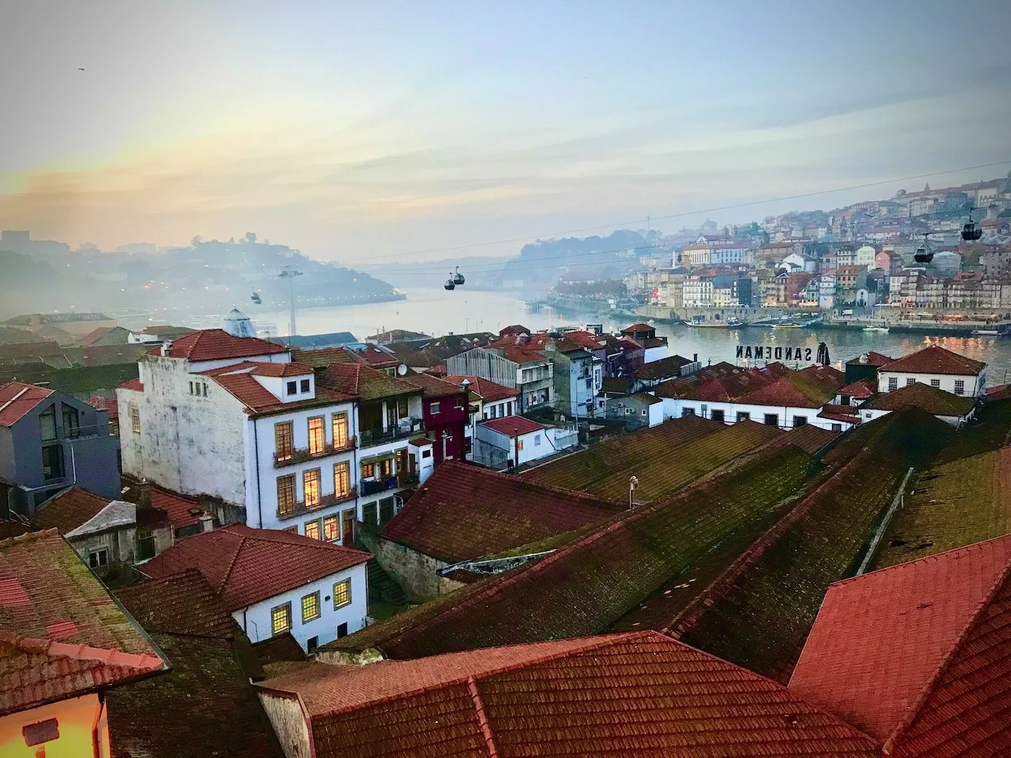  In Gaia, Portugal, in 2018 looking across the river at Porto, Portugal while receiving Maroon Choreography. 
