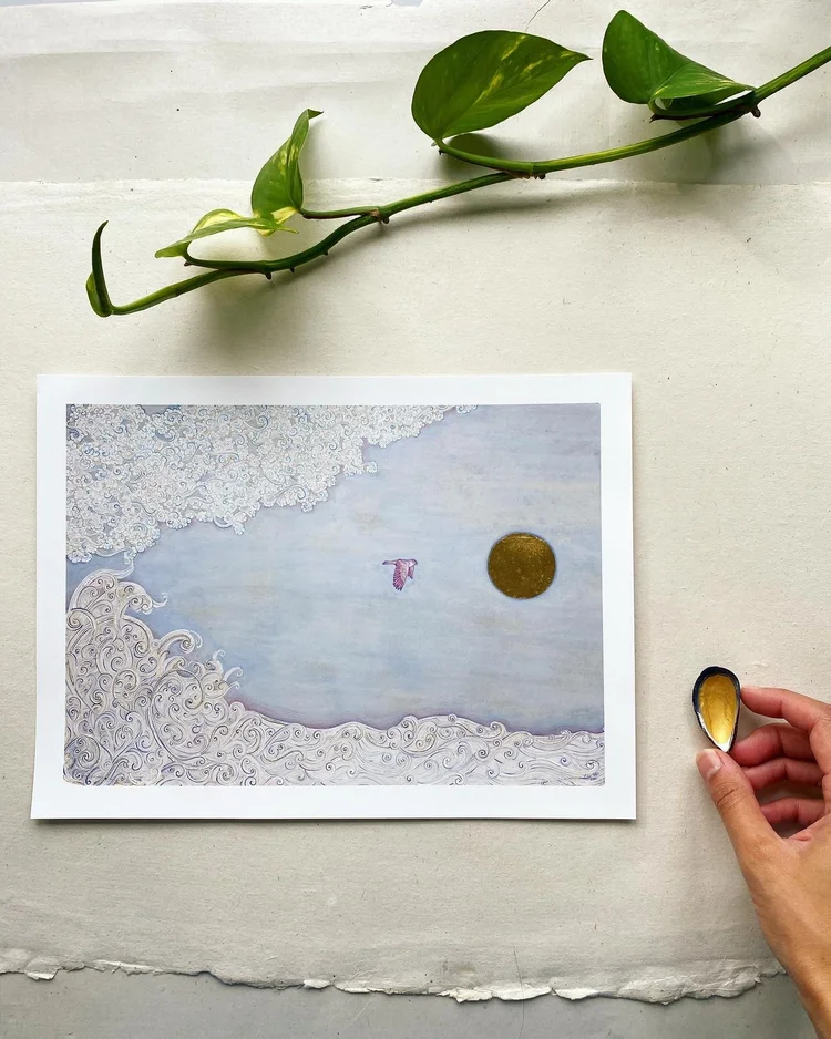 Solace art print by Mobeen Akhtar, showing a purple bird flying towards a gold circle amid pale patterned borders.