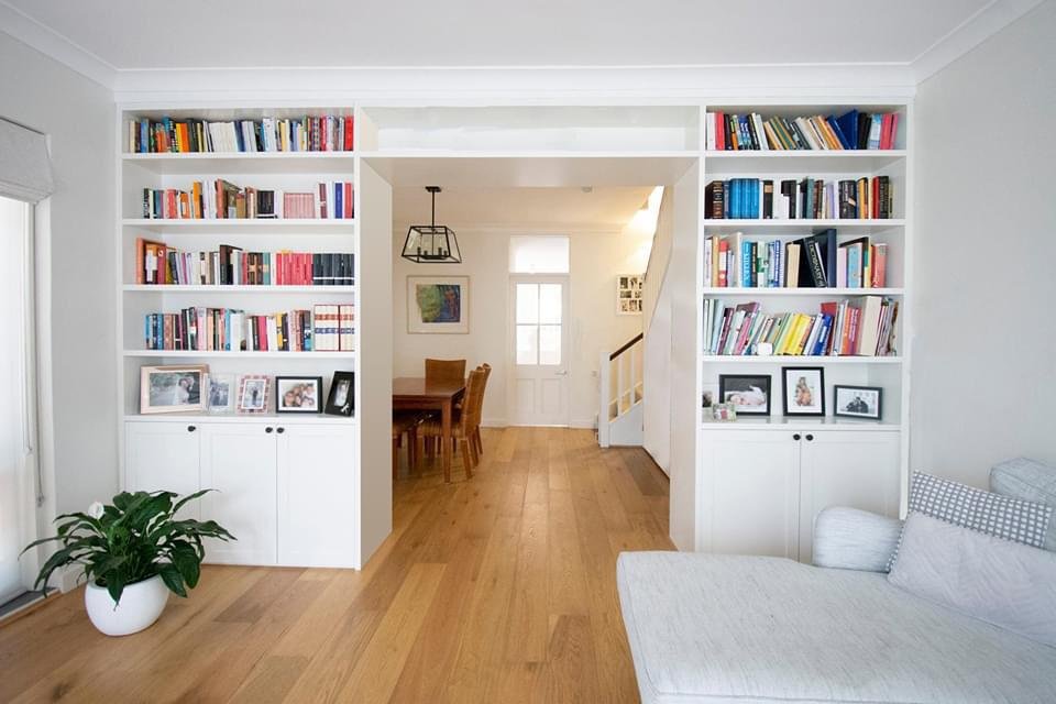  Built in bookcase creating a warm reading space and archway to the lounge room  
