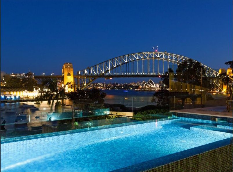  Stunning blue tile pool with views of Sydney harbour. 