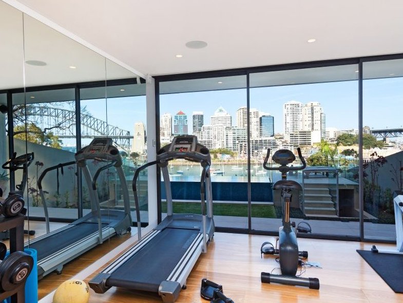  Private gym overlooking the grass and lap pool 