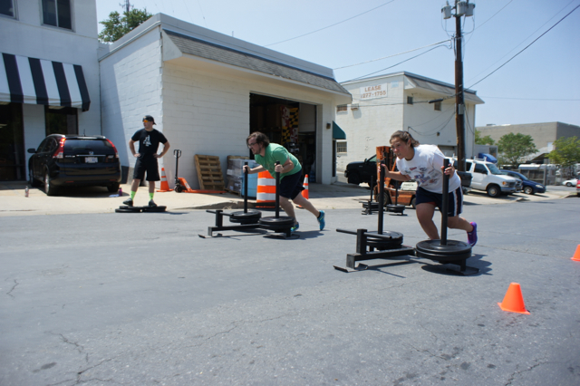 mallory and matt sled push .jpg