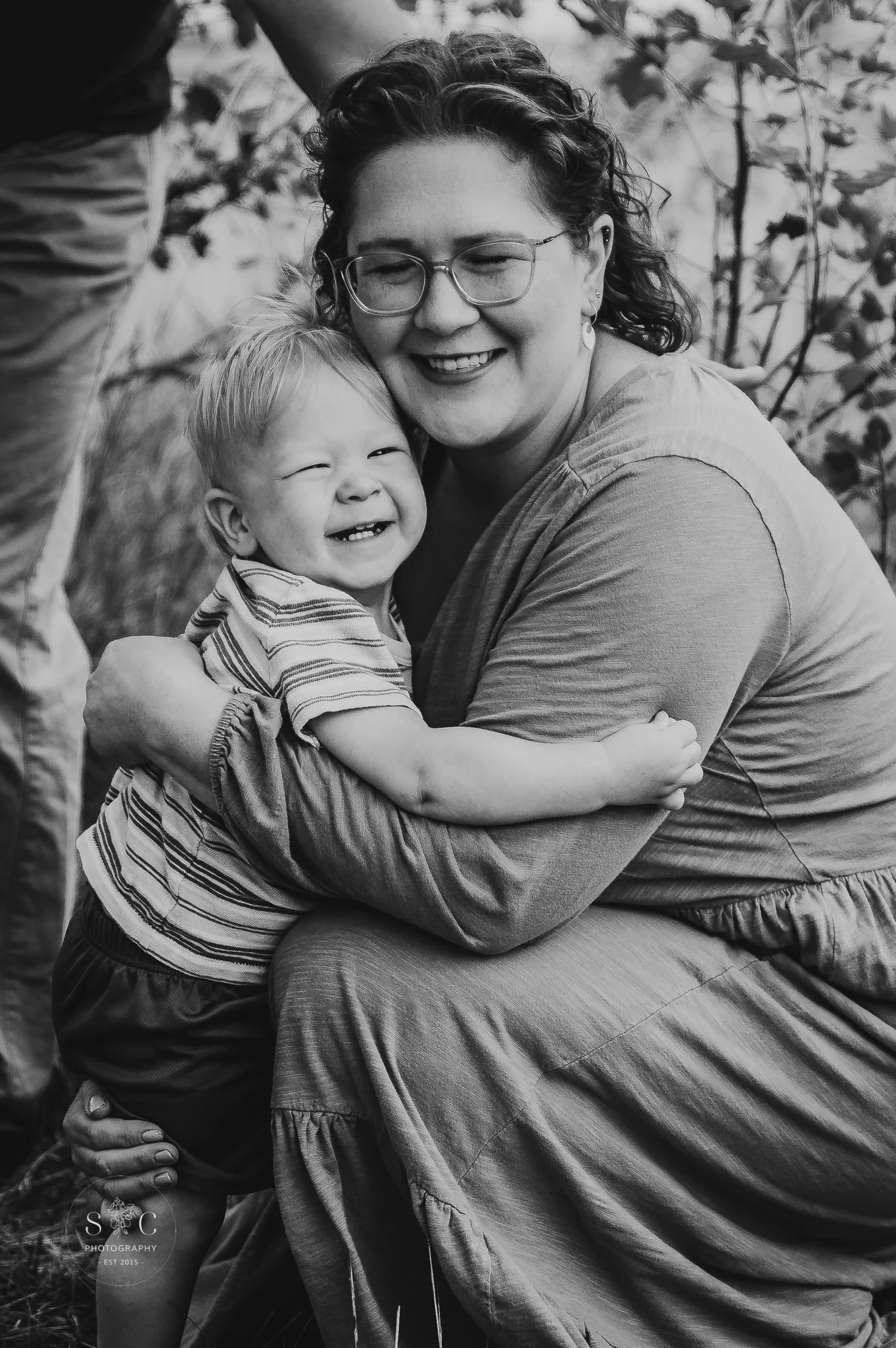 Mom laughing with toddler during motherhood mini session, Dickinson North Dakota photographer