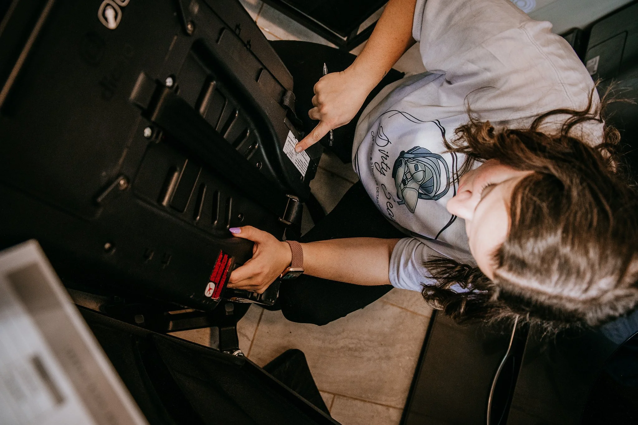Lexie Smith reviews car seat expiration date in her Dickinson home