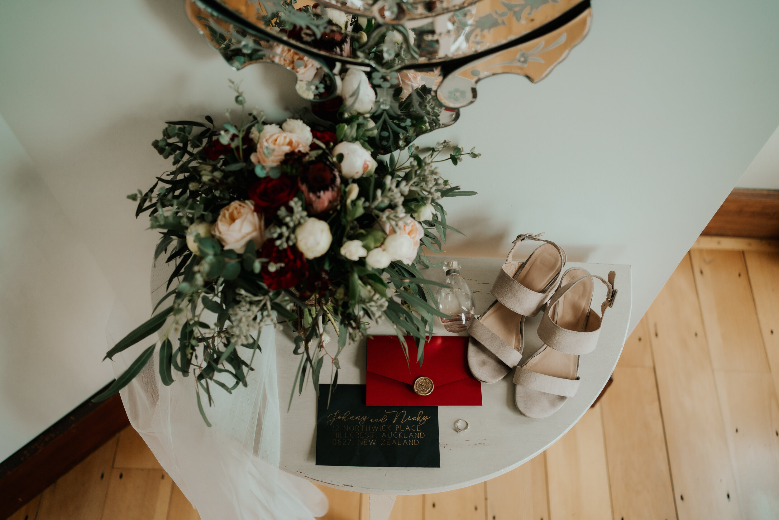 Wedding details including bouquet and stationery