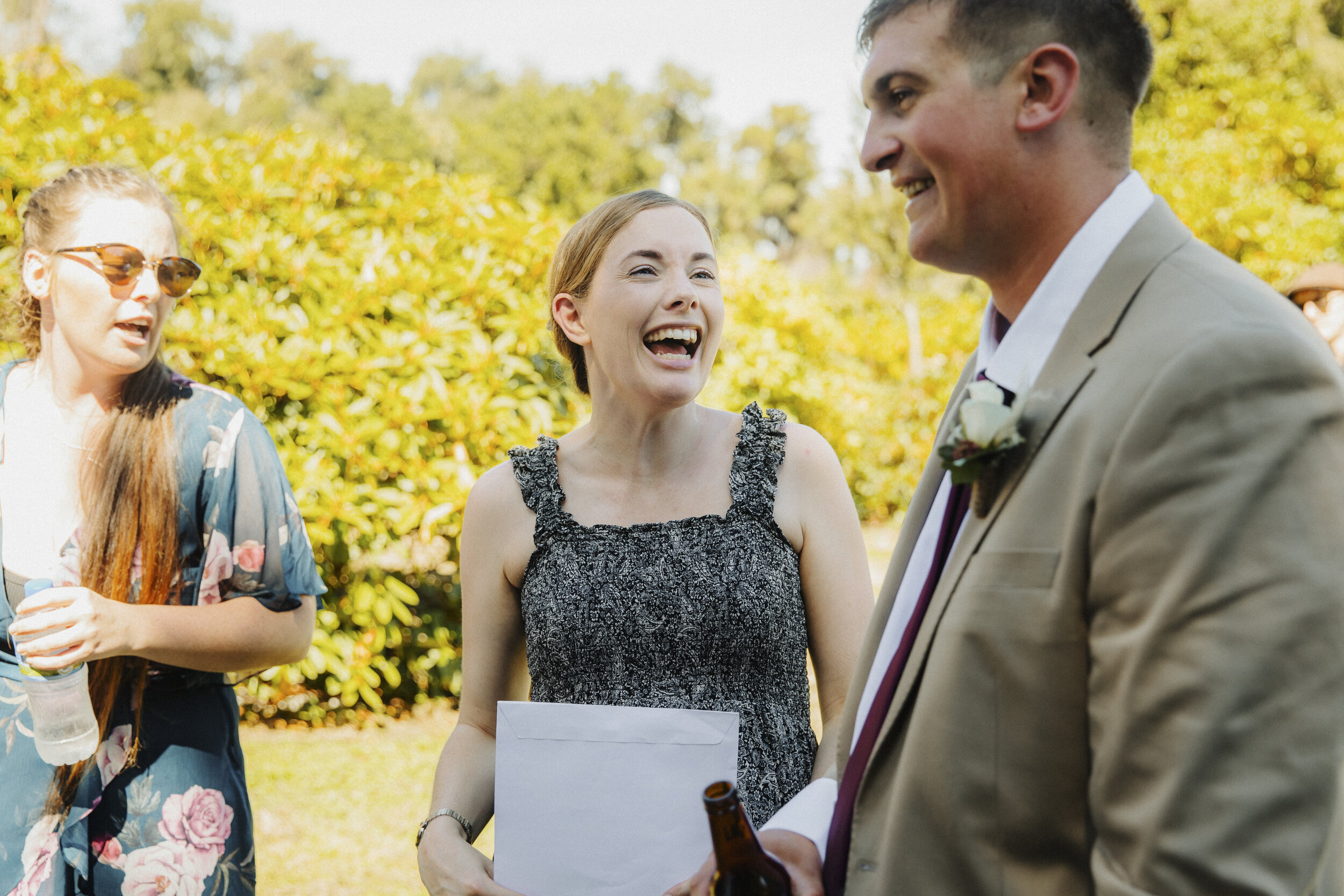 Celebrant and Groom laughing after ceremony