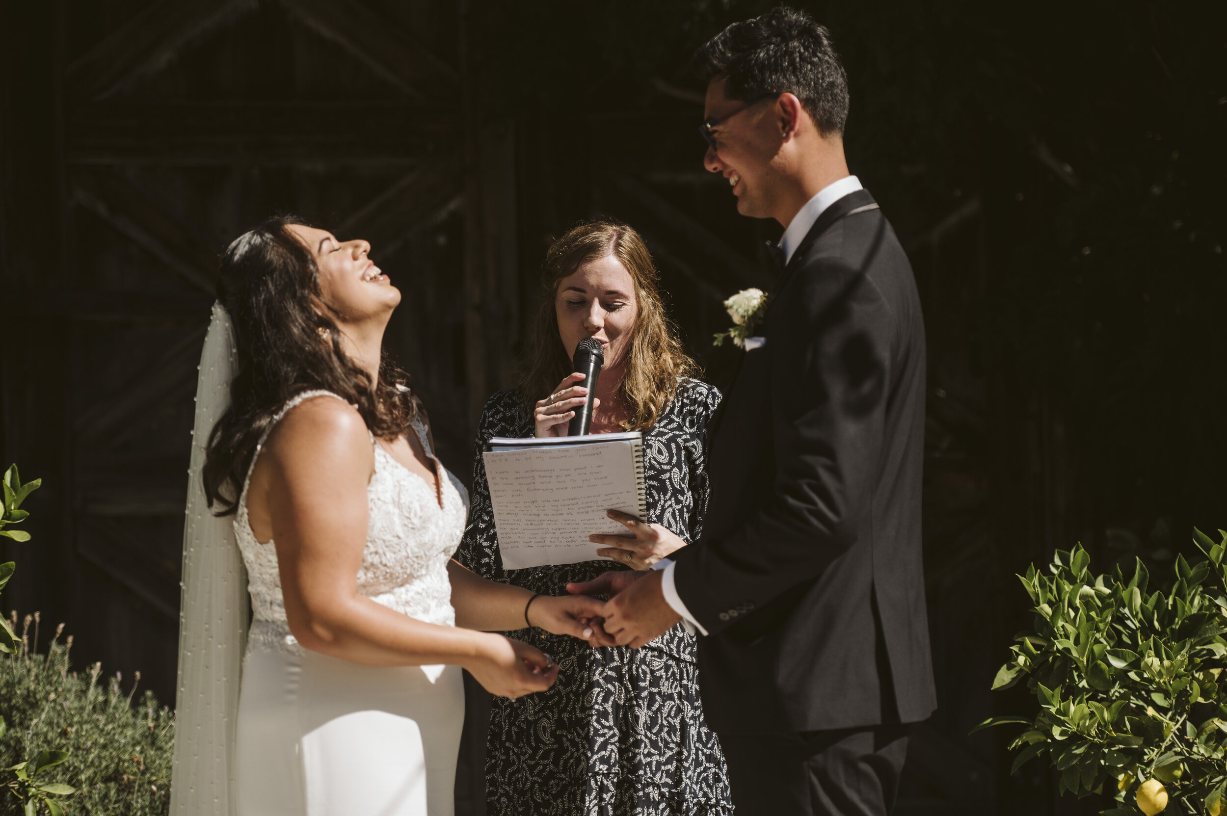 Bride Groom laughing during vows