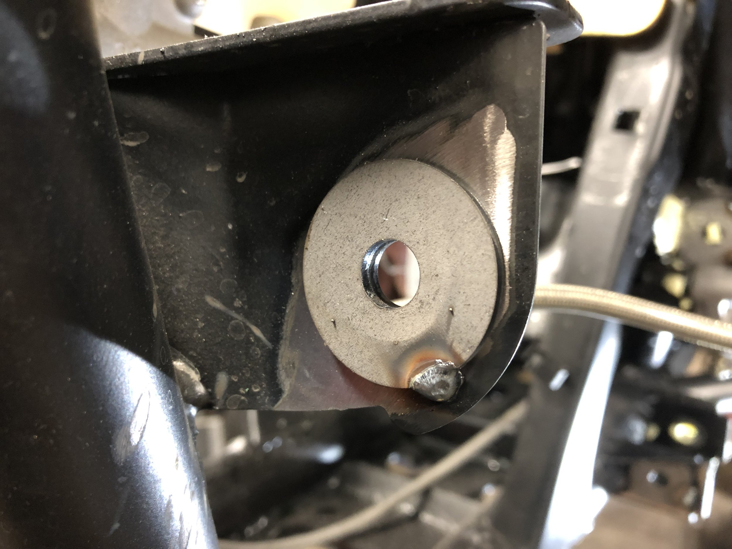  Adding support washers to strengthen a a-arm and shock mounts.  