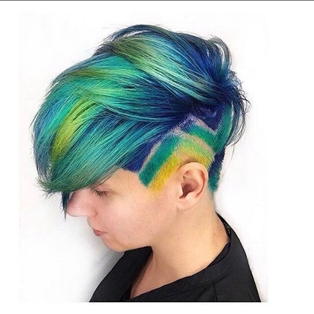 If this isn&rsquo;t creative color, we don&rsquo;t know what to tell you! 💚💙💛This incredible color and cut was done by our color specialist @onikasimone !! She is available for bookings Friday&rsquo;s and Saturday&rsquo;s
.
.
.
.
.
#creativecolor 