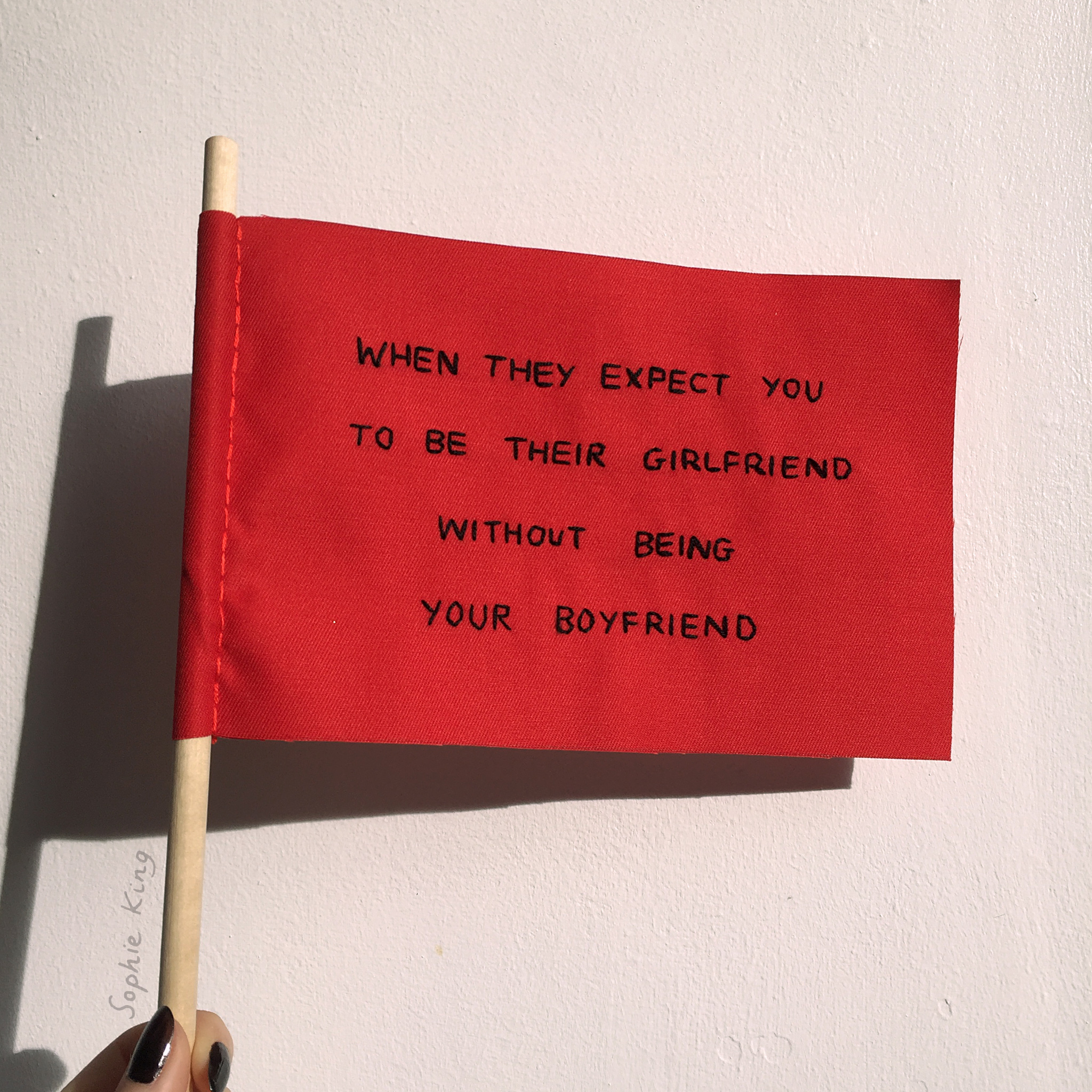 embroidered "when they expect you to be their girlfriend without being your boyfriend" red flag, 2019, Sophie King
