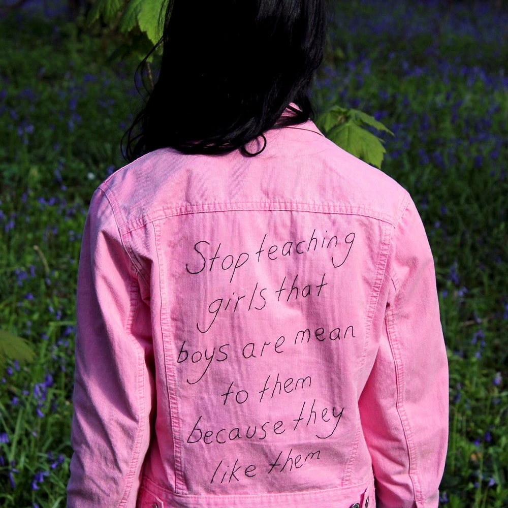 "stop teaching girls that boys are mean to them because they like them" embroidery on denim jacket, 2016, Sophie King