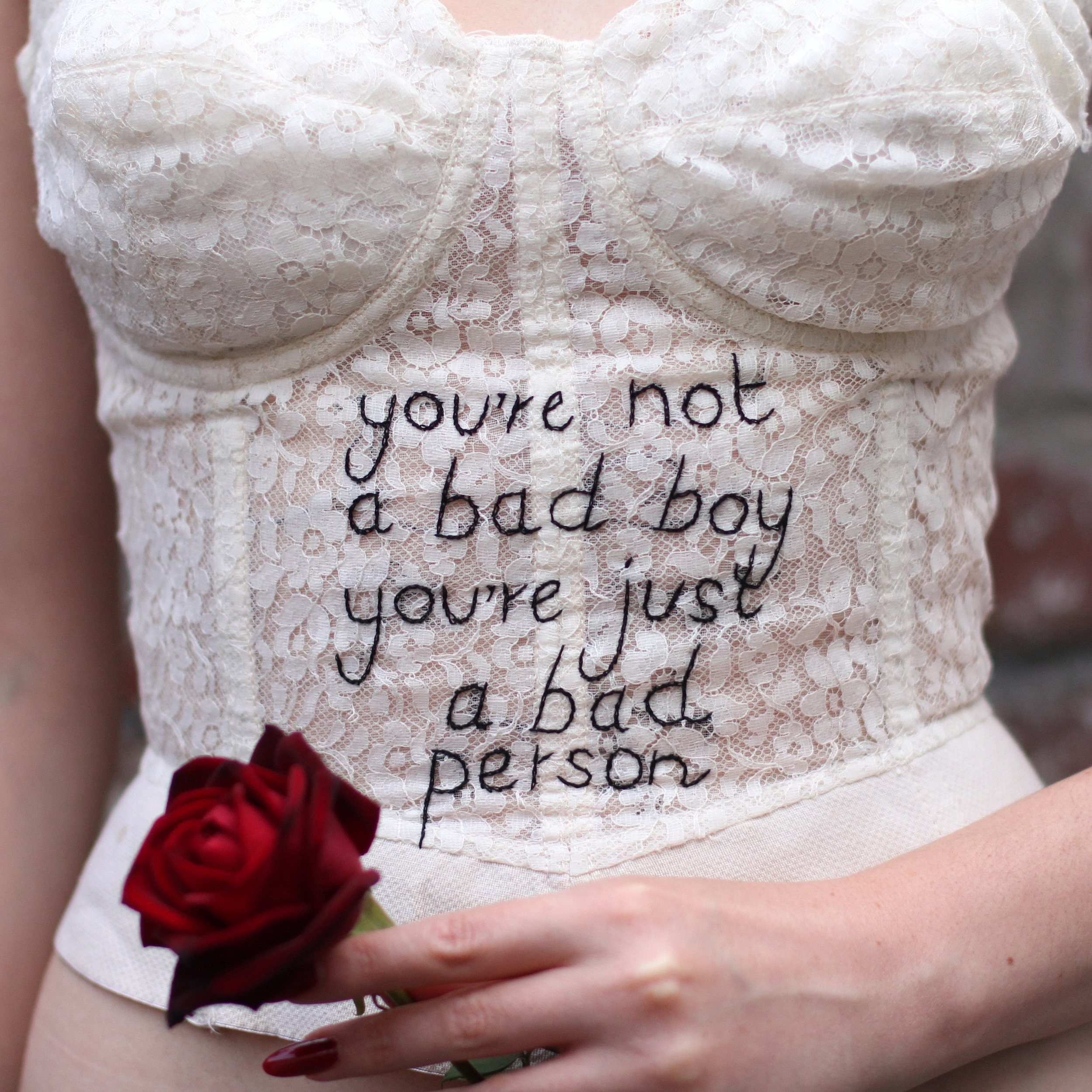 embroidered "you're not a bad boy, you're just a bad person" corset, 2017, Sophie King