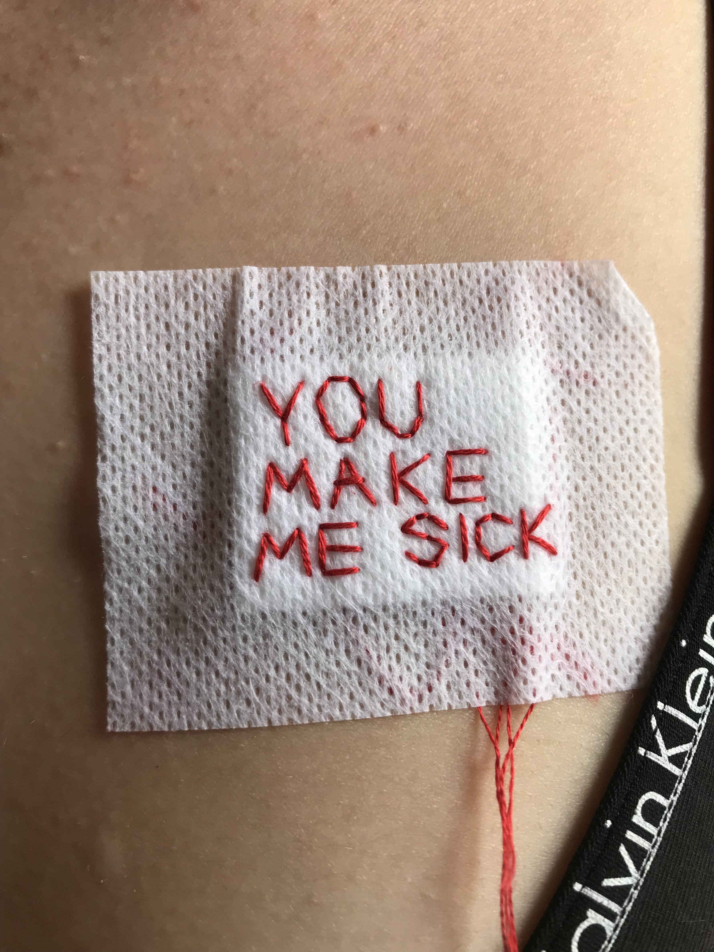 embroidered "you make me sick" plaster, 2018, Sophie King