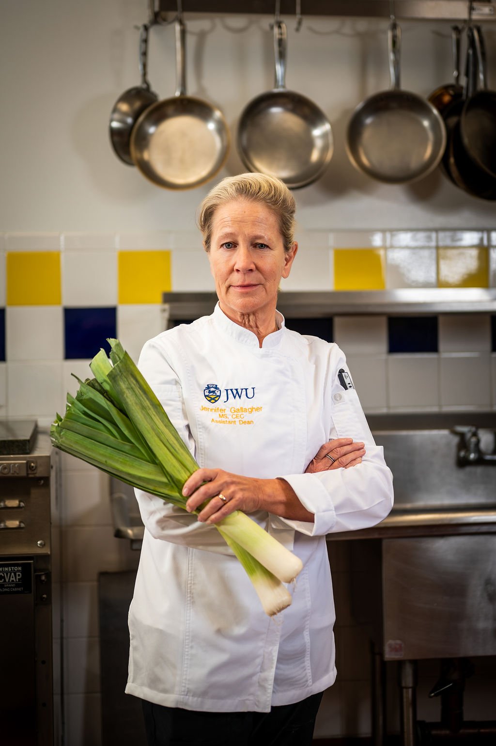Professional environmental portrait of a chef in a commercial kitchen at Johnson & Wales University in Charlotte, NC.