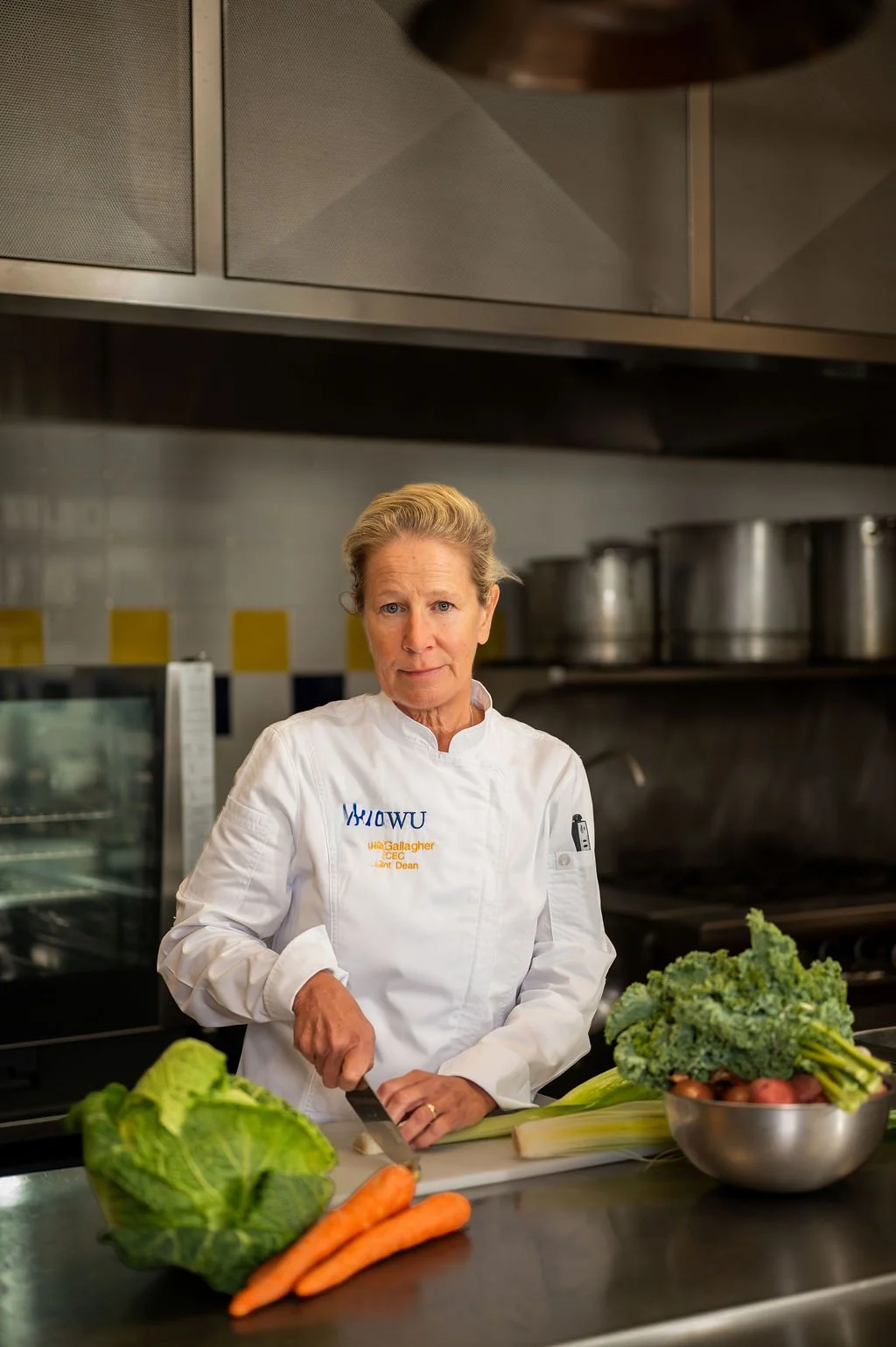 Professional environmental portrait of a chef in a commercial kitchen at Johnson & Wales University in Charlotte, NC.