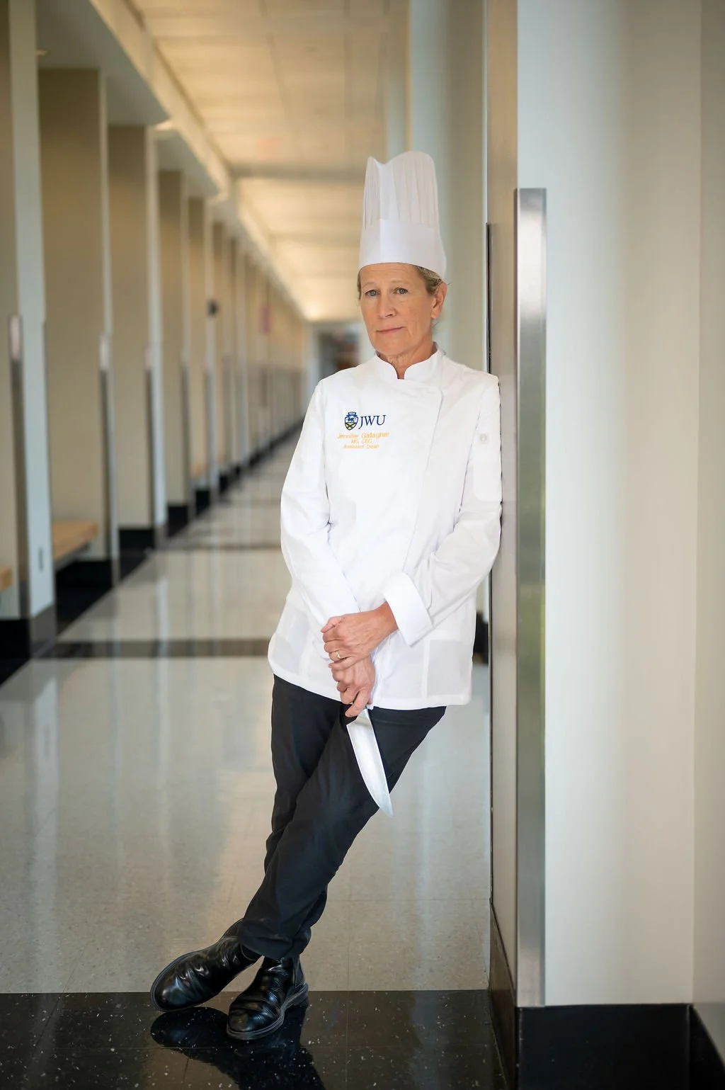 Professional environmental portrait of a chef in a commercial kitchen at Johnson & Wales University in Charlotte, NC.