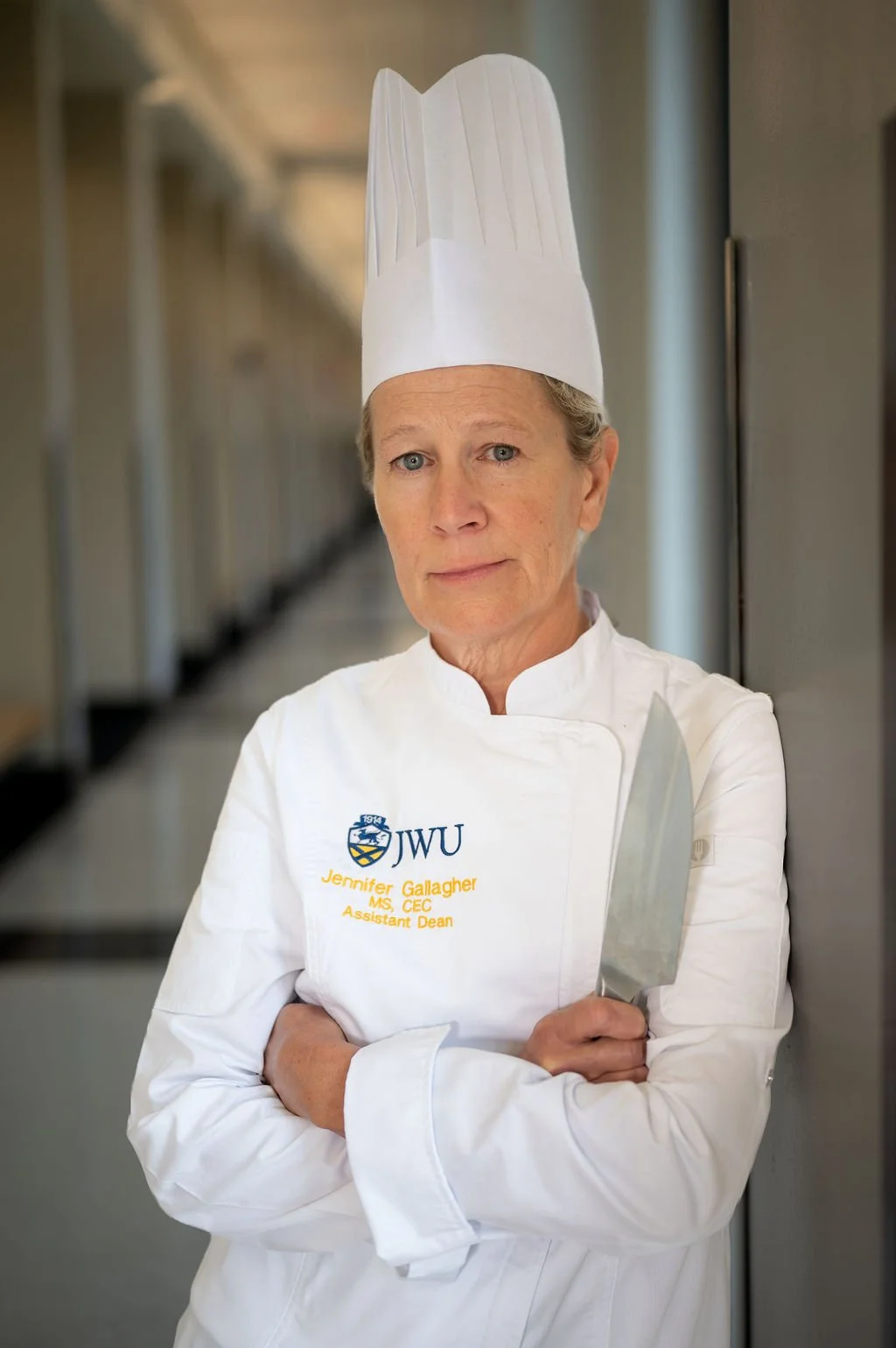 Professional environmental portrait of a chef in a commercial kitchen at Johnson & Wales University in Charlotte, NC.